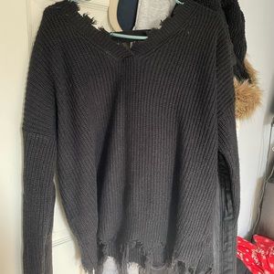 Black shredded sweater, 1X, fits like a regular large. From rainbow.